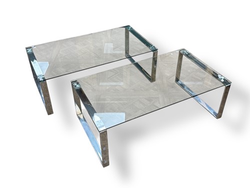 Lot 829 - A pair of low glass topped tables and polished...