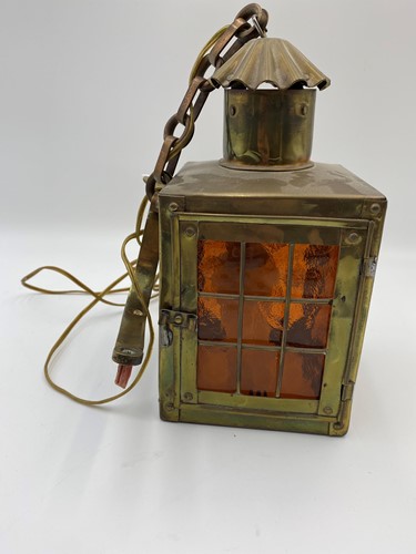 Lot 165 - A small square lantern fitted with grill sides...