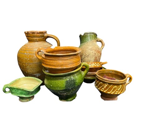 Lot 106 - An attractive group of mainly green glazed...