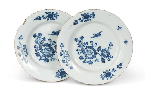 Lot 111 - A pair of 18th century tin glazed chargers...
