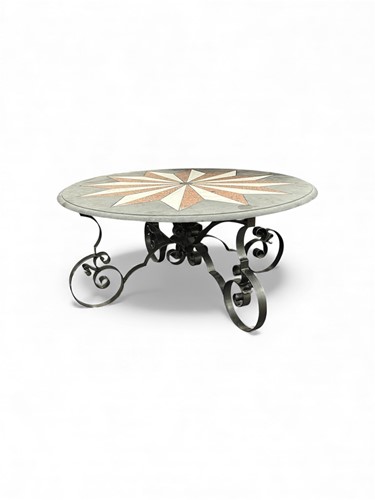 Lot 780 - A slate topped circular coffee table, the top...