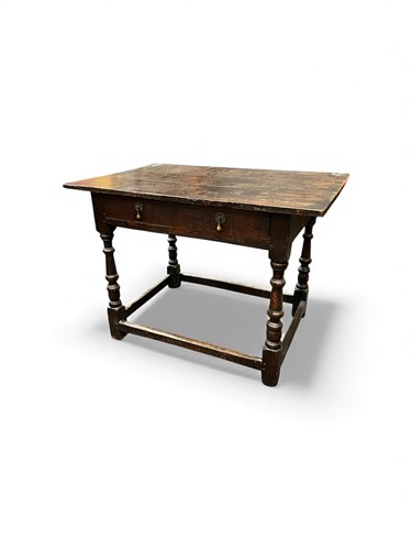 Lot 701 - A 17th or 18th century oak side table with...