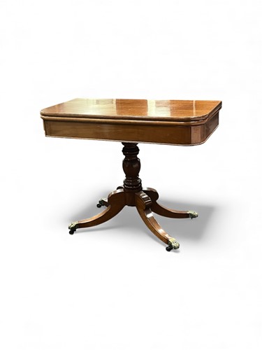 Lot 622 - A mahogany tea table, 19th century, the...