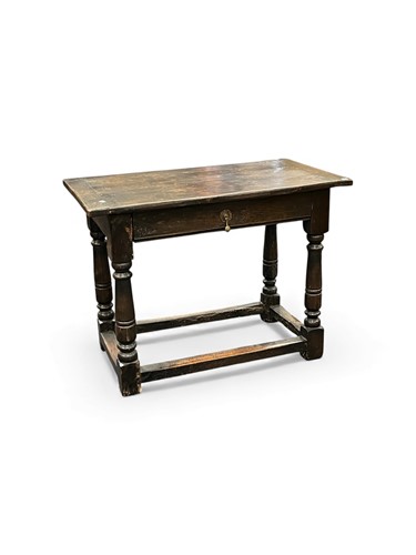 Lot 697 - A 17th or 18th century oak side table with...