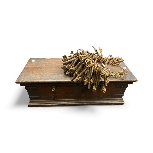 Lot 159 - An oak box fitted with flanking carry handles,...