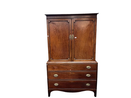 Lot 471 - A mahogany linen press, 19th century,...