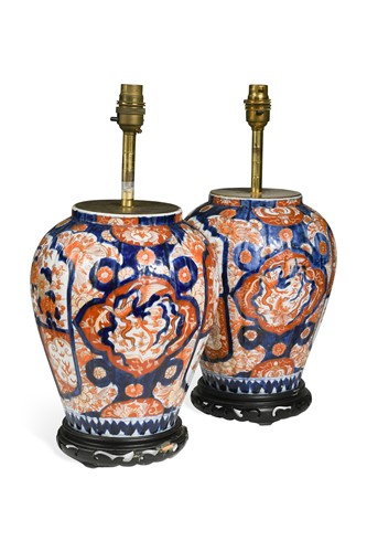 Lot 322 - A pair of ribbed Imari ceramic lamps, 20th century