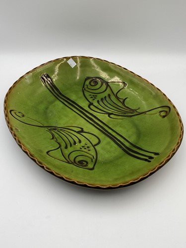 Lot 26 - Slip glazed platter with fish decoration on...