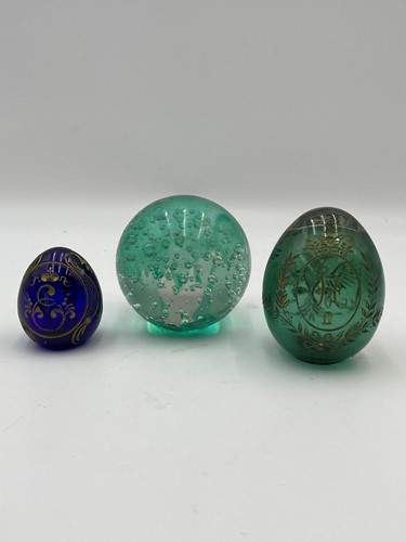 Lot 46 - Two modern cut glass eggs with gilded...