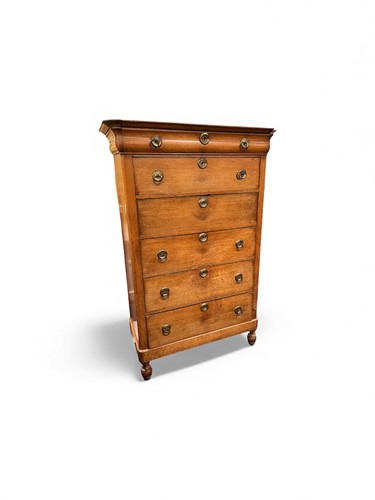 Lot 782 - A tall chest of six long drawers, walnut,...