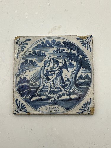 Lot 31 - An 18th century style Dutch Delft or tin...