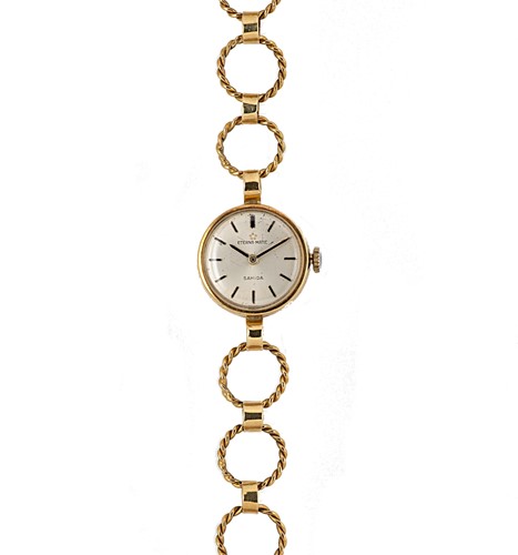 Lot 256 - Eterna-Matic Sahida - An 18ct gold fancy bracelet wristwatch