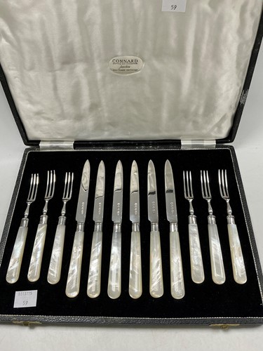 Lot 328 - A cased set of six mother-of-pearl handled...