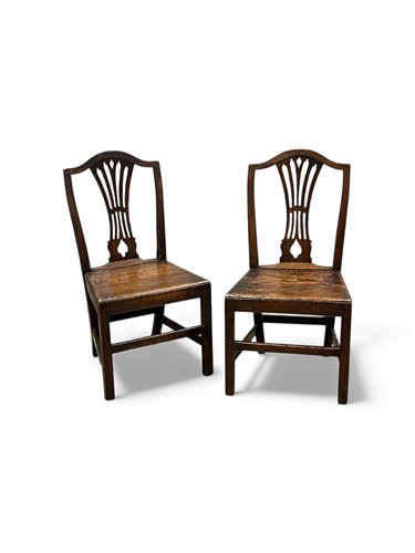 Lot 707 - A pair of George III ash and elm side chairs