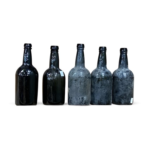 Lot 134 - Four 19th century glass bottles with raised...