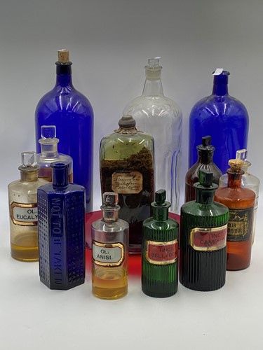 Lot 125 - A pair of 19th century dark blue glass bottles,...