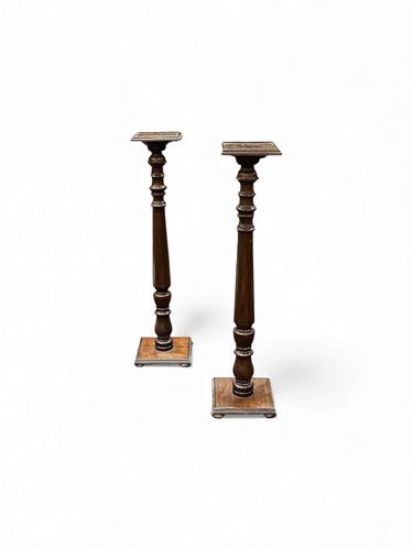 Lot 630 - A pair of mahogany torcheres/ plant stands,...