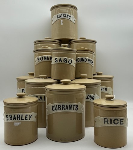 Lot 93 - A set of six graduated stoneware lidded food...