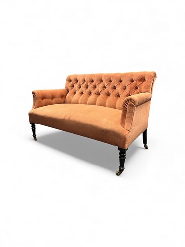 Lot 409 - A small Victorian two seat sofa with deep...
