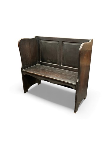 Lot 704 - An oak panelled two seat hall bench, circa...