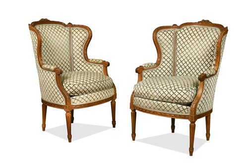 Lot 449 - A pair of Louis XVI style beech high-backed bergère armchairs, 20th century