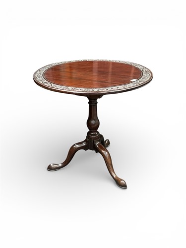 Lot 768 - A 19th century mahogany tripod table, the top...