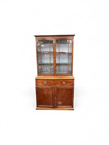 Lot 356 - A mahogany bookcase, 19th century, with a pair...