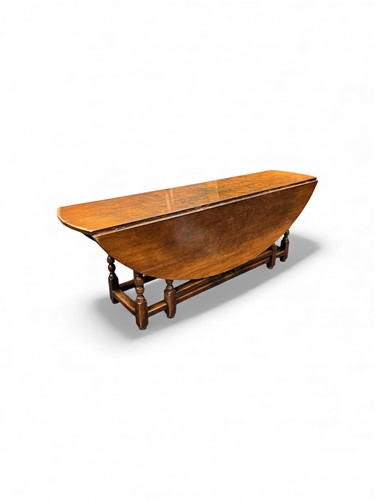 Lot 632 - An 18th century style oak wake table, 20th...