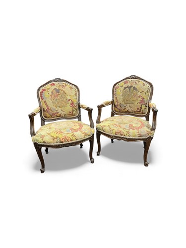 Lot 375 - A pair of Louis XV style stained beech...