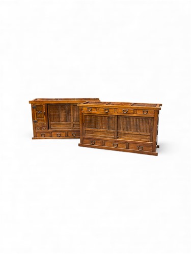 Lot 740 - A pair of stained hardwood Eastern sideboards...