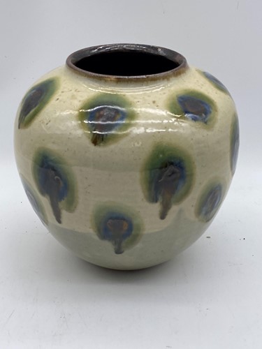 Lot 22 - A bulbous studio pottery vase, painted with...