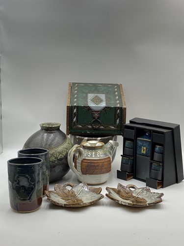 Lot 102 - A collection of studio pottery to include: a...