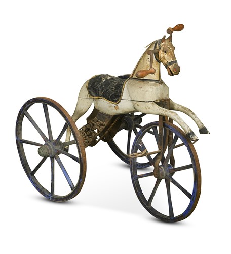 Lot 696 - A French carved wood juvenile horse tricycle or velocipede, 19th century