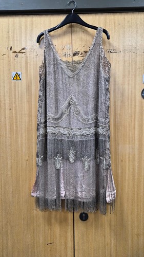 Lot 144 - A 1920s Art Deco 'Flapper' dress, stitched...