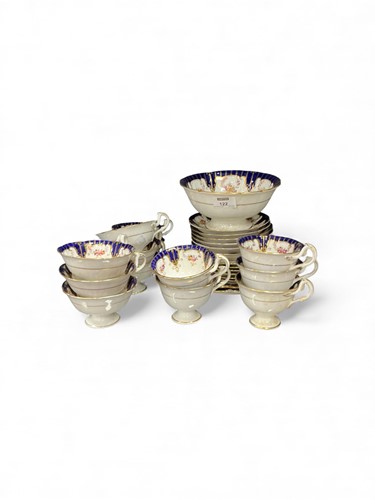 Lot 122 - A late 19th century blue and floral bone china...