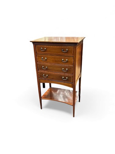 Lot 629 - An Edwardian mahogany music cabinet with four...