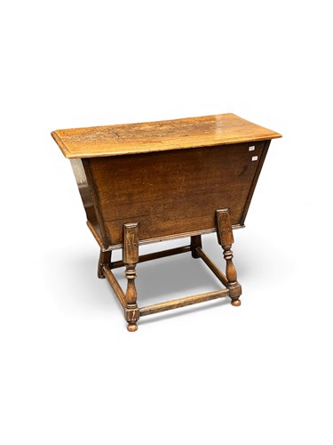 Lot 688 - An antique oak dough bin, with moulded hinged...