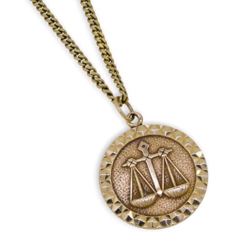 Lot 7 - A 9ct gold zodiac pendant and chain