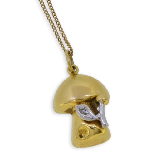 Lot 8 - A diamond set pendant in the style of a mushroom and chain