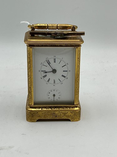 Lot 214 - A French small size repeating carriage clock...