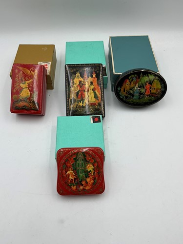 Lot 227 - Four Russian lacquer boxes painted with...