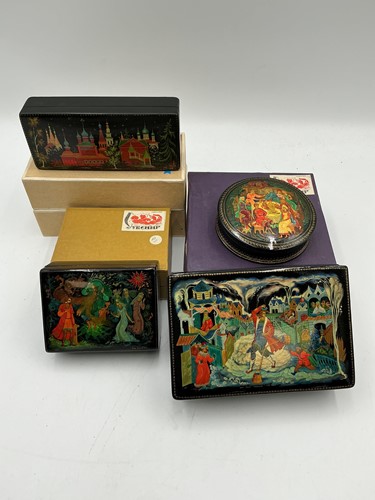 Lot 229 - Four Russian lacquer boxes painted with...