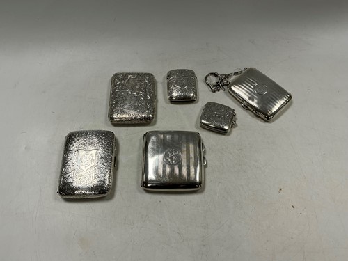Lot 351 - A group of six English hallmarked cigarette or...