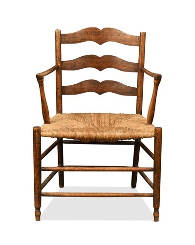 Lot 201 - Attributed to Ernest Gimson, an ash-framed ladderback elbow chair
