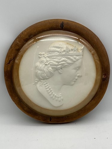 Lot 9 - A 19th century plaster plaque of Queen...