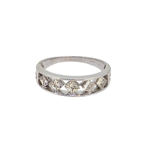Lot 14 - A 9ct white gold diamond set half hoop style ring