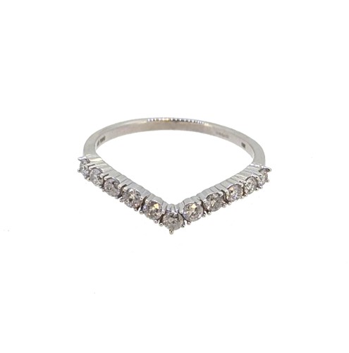 Lot 15 - A 9ct white gold diamond set wishbone style ring