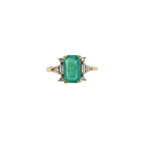 Lot 203 - An 18ct gold emerald and diamond ring