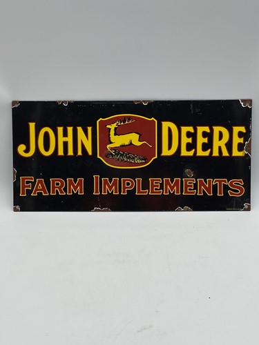 Lot 49 - John Deere, an enamelled sign 21 x 45cm