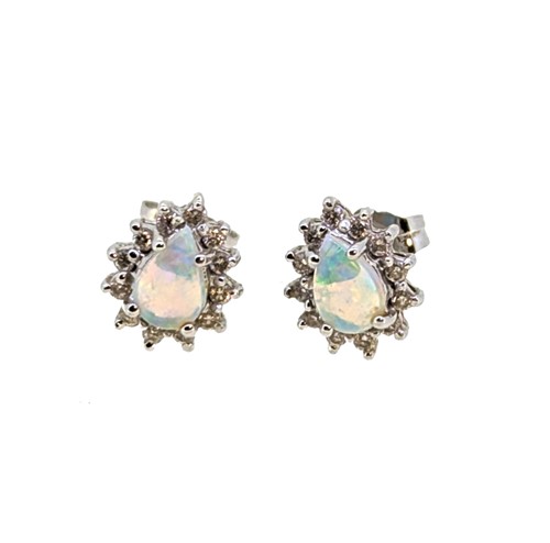 Lot 17 - A pair of 18ct gold opal and diamond cluster ear studs